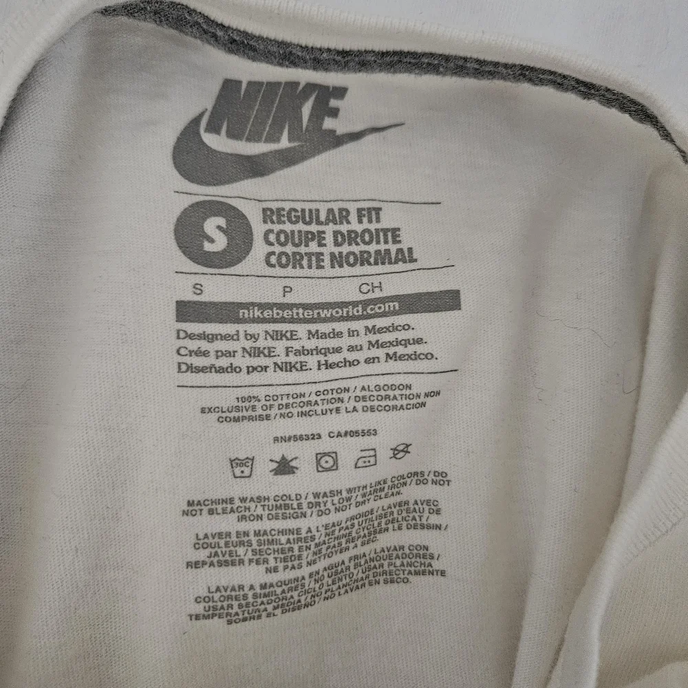 Nike Men's White Tee with Green and Yellow Swoosh